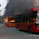 Passenger buses go up in flames during a protest against Citizenship Amendment Act in New Delhi.